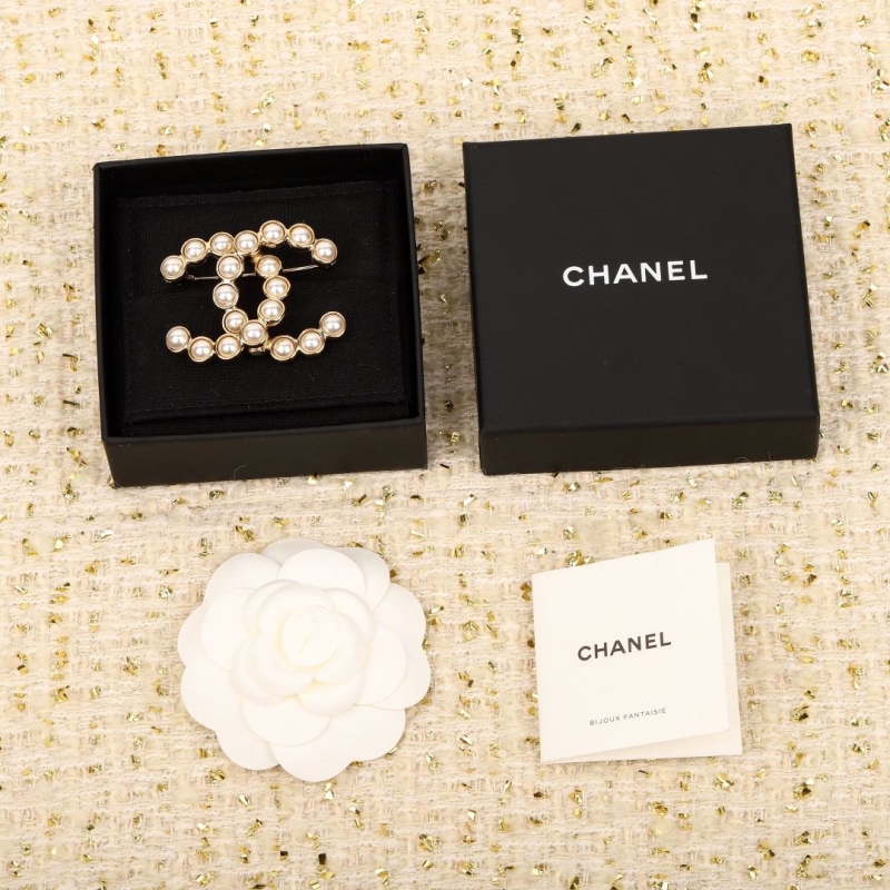 Ch**el brooches